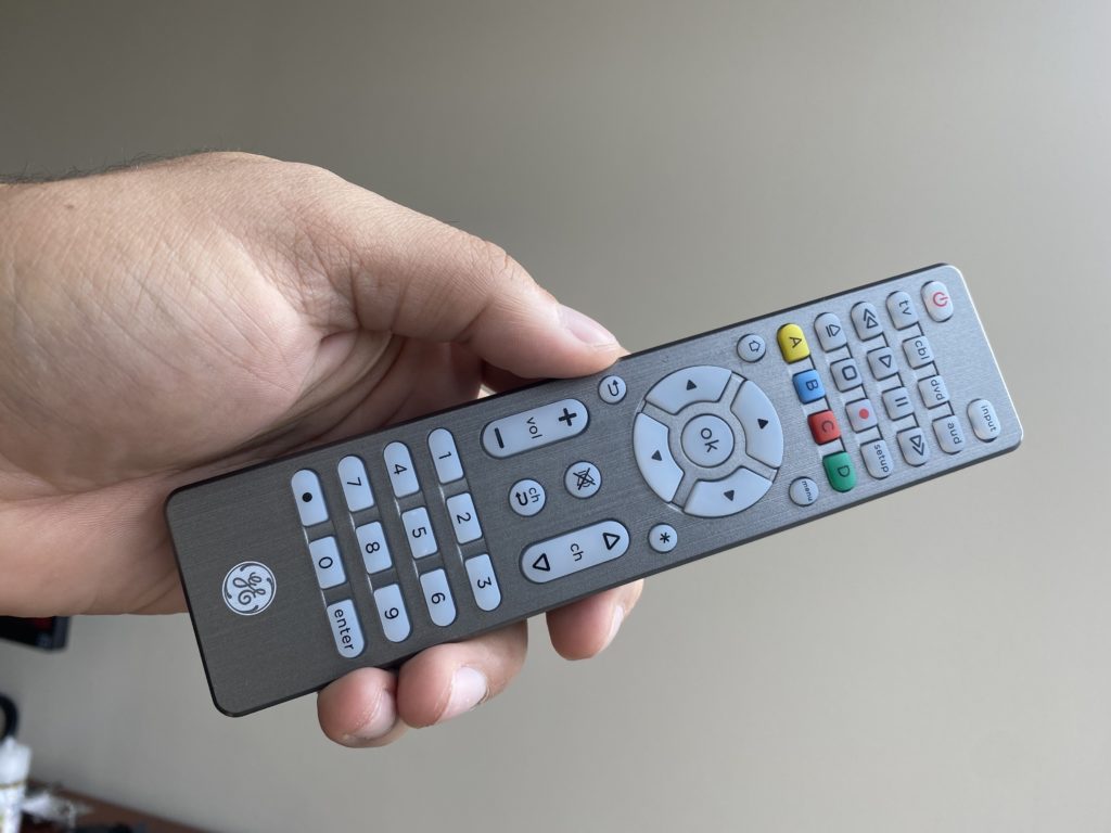 Hand Holding GE Universal Remote